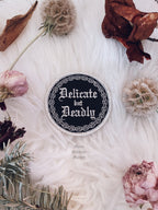 Delicate but Deadly Iron On Patch - Moon Goddess Market