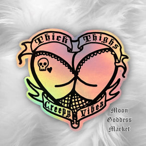 Thick Thighs Creepy Vibes 4.5” holographic sticker - Moon Goddess Market